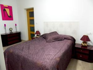 Postel nebo postele na pokoji v ubytování Apartamentos Capuchinas