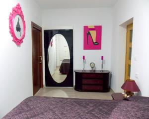 Postel nebo postele na pokoji v ubytování Apartamentos Capuchinas
