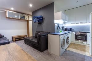 Køkken eller tekøkken på Air-Conditioned Apartment Šancová - Old Town + 13 billeder