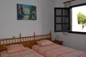 Postel nebo postele na pokoji v ubytování Apartamento Reni