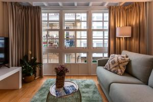 Posezení v ubytování APARTAMENTOS FRANJA 55