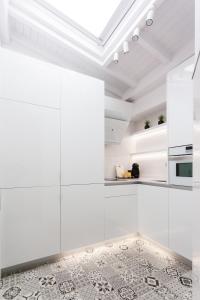 Kuchyň nebo kuchyňský kout v ubytování APARTAMENTOS FRANJA 55