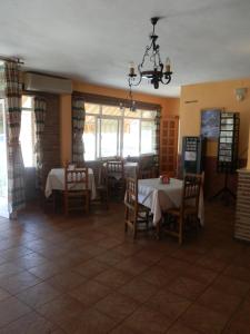 מסעדה או מקום אחר לאכול בו ב-Pensión Restaurante Páramo