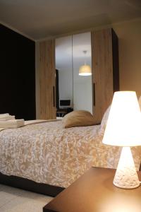 A bed or beds in a room at B&B Relais Aeclanum