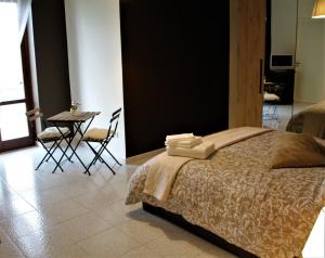 A bed or beds in a room at B&B Relais Aeclanum