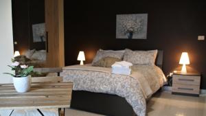 A bed or beds in a room at B&B Relais Aeclanum