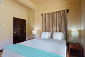 Ένα ή περισσότερα κρεβάτια σε δωμάτιο στο Suite I302 at Mara Laguna Gold Standard Certified