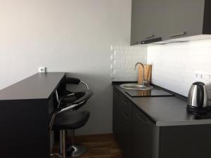 Kuchyň nebo kuchyňský kout v ubytování SkiLuxe New Gudauri - Loft 2 + 9 fotografií