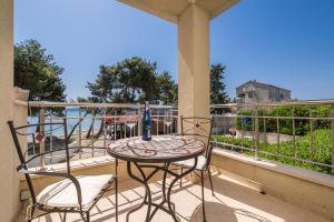 Balcon ou terrasse dans l'établissement Beachfront Apartments Gabine