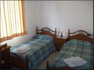 Llit o llits en una habitació de B&B Ramses
