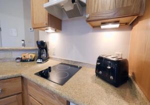 a kitchen with a counter top with a toaster on the counter at Bell Rock Inn in Sedona