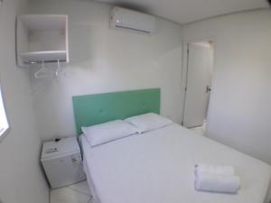 Cama o camas de una habitación en RAFAELLO HOTEL