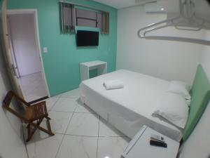 Cama o camas de una habitación en RAFAELLO HOTEL