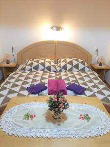 Postel nebo postele na pokoji v ubytování Apartment Sonce