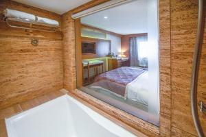 Postel nebo postele na pokoji v ubytování Hotel Bawa International