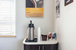 a coffee maker sitting on top of a table at The Reserve Inn in Salisbury