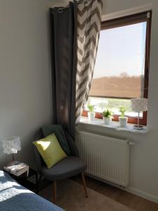 Postel nebo postele na pokoji v ubytování Apartament Zamojska - GarwoNocka