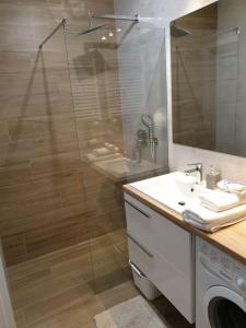 Koupelna v ubytování Apartament Zamojska - GarwoNocka + 26 fotografií