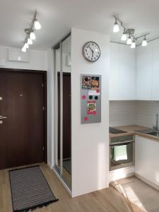 Kuchyň nebo kuchyňský kout v ubytování Apartament Zamojska - GarwoNocka
