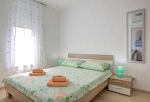 Katil atau katil-katil dalam bilik di Apartment Waves-Villa Sunce