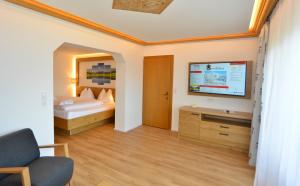 TV o dispositivi per l'intrattenimento presso Hotel Residenz Hochland