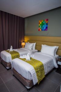 Postel nebo postele na pokoji v ubytování Hotel Costa Brava