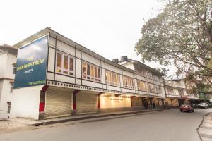 a building on the side of a street at Jagjeet's Sikkim Retreat in Gangtok