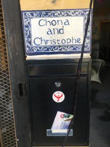 a sign for a choir and christolate on a black box at Chona and Christophe Guesthouse - Cavite in Dasmariñas