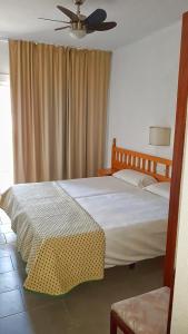 Postel nebo postele na pokoji v ubytování Hostal Isabel