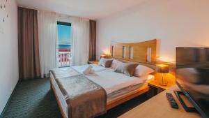 Postel nebo postele na pokoji v ubytování Veya Maradiso Hotel by Aminess