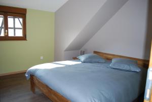 Кровать или кровати в номере LE LOFT