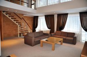A seating area at Olymp Hotel