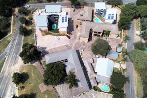 an overhead view of a house with a yard at Nelspruit Lodge in Nelspruit