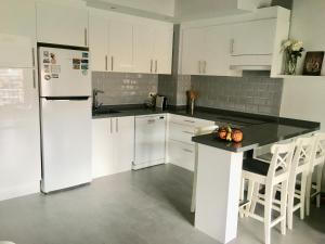 Kuchyň nebo kuchyňský kout v ubytování La Casa Mia i Villajoyosa