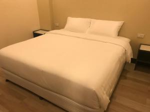 Babylon Oslob Coast Guesthouse客房内的一张或多张床位