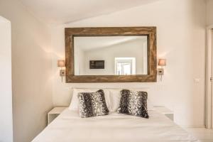 Кровать или кровати в номере Appartamento di design con vista sui monti
