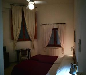 Postel nebo postele na pokoji v ubytování VisitPonza - Le Stanze Sulla Spiaggia