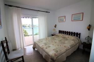 A bed or beds in a room at Global Immo 3213 Horizonte Azul