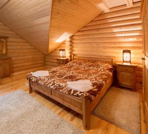 Ένα ή περισσότερα κρεβάτια σε δωμάτιο στο Gans Hotel