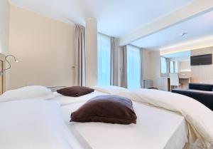 Postel nebo postele na pokoji v ubytování Hotel Panorama
