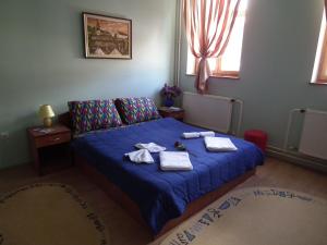 Kama o mga kama sa kuwarto sa Naša Tvrđava Guest Accommodation