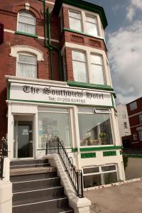 a store front of a red brick building at Southview Hotel in Blackpool
