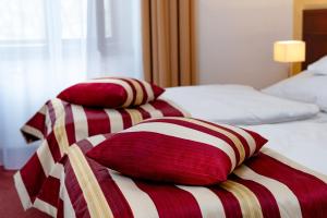 Postel nebo postele na pokoji v ubytování Hotel Petr