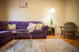 A seating area at Perfect Apartment
