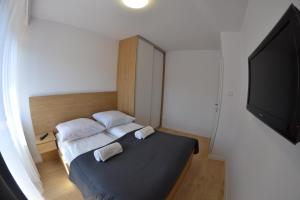 Postel nebo postele na pokoji v ubytování Apartamenty Natalia - bezpłatny parking