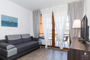 Posedenie v ubytovaní Jantar Apartamenty City Center