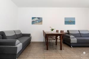 Posedenie v ubytovaní Jantar Apartamenty City Center