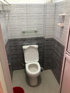 Ванная комната в Lakse Inn Homestay