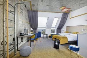 Postel nebo postele na pokoji v ubytování Hotel Arche Geologiczna