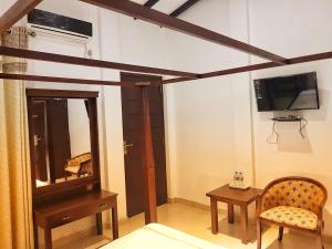 Μια τηλεόραση ή/και κέντρο ψυχαγωγίας στο Livinya Holiday Resort